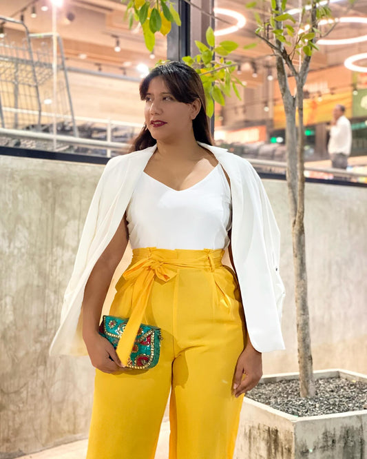 White jumper with low-cut yellow