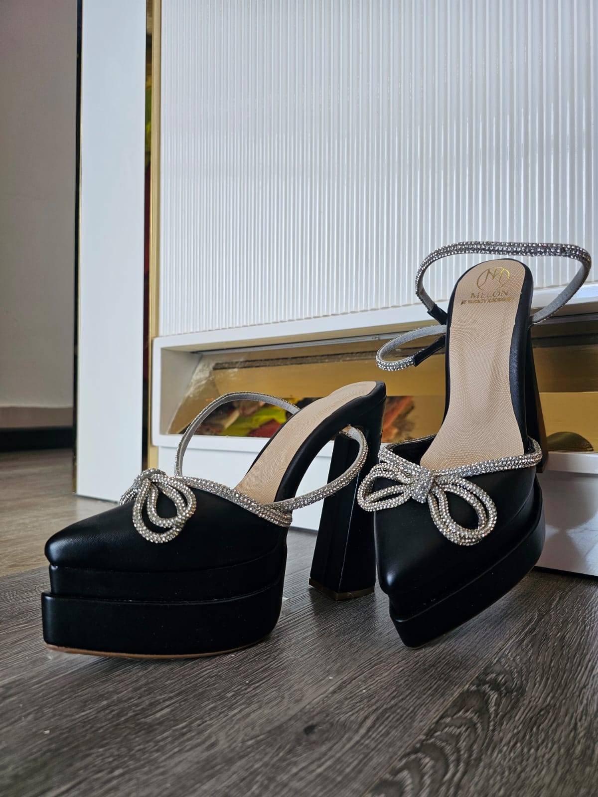 Black platform heels with silver details